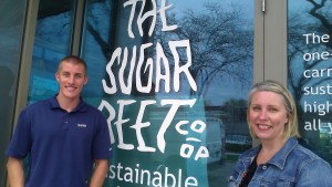 Cheryl Munoz (right, with Scott McAdam Jr. of McAdam Landscaping) is the founder of The Sugar Beet Co-Op in Oak Park.